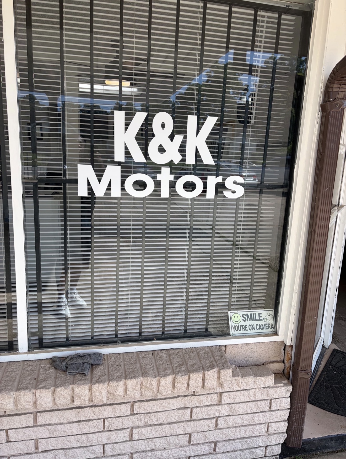 K&K Motors lettering on the office window